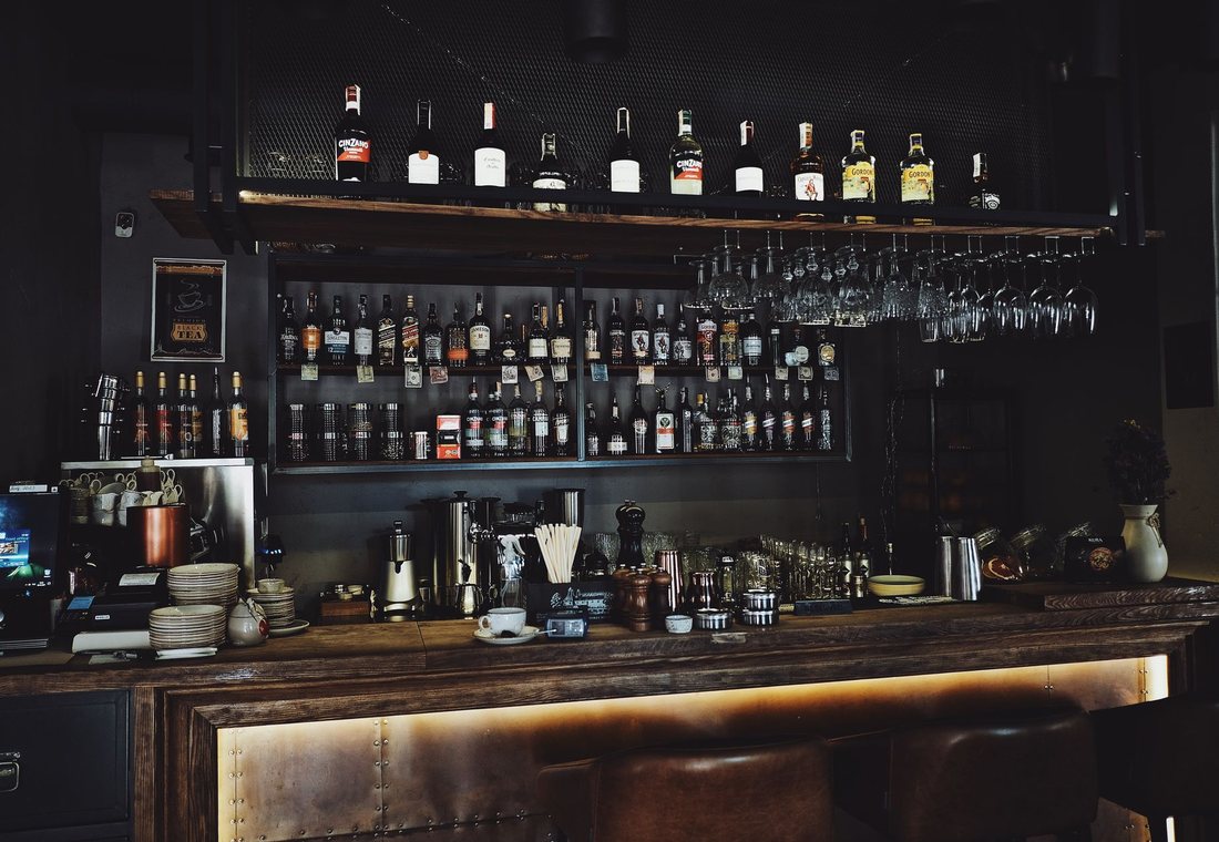 Cocktail bar counter with bottles