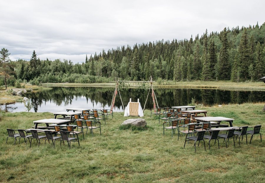 Outdoor wedding setting by the lake